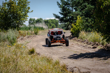 Cool view on UTV, 4x4 off-road vehicle on competition in summer