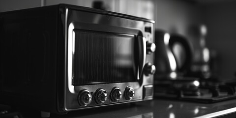 A toaster oven sitting on top of a counter. Perfect for small kitchens or quick meals