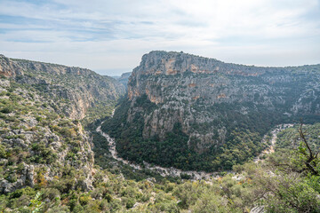 Naklejka premium Cennet and Cehennem (English: heaven and hell) are the names of two large sinkholes in the Taurus Mountains, in Mersin Province, Turkey. The sinkholes are among the tourist attractions of the province