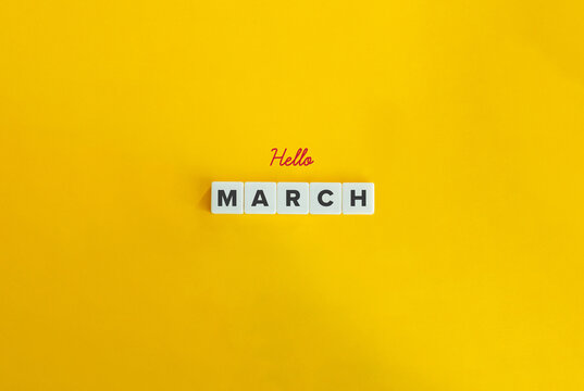 Hello March. Block Letter Tiles and Cursive Text on Flat Background. Minimalist Aesthetics.