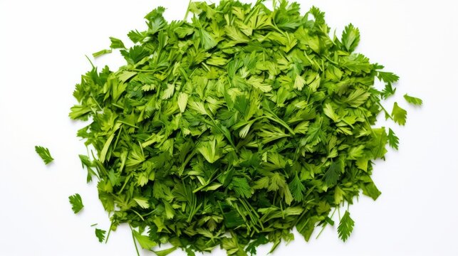 Top view of pile of chopped dry parsley leaves isolated on white - culinary herb, cooking ingredient, food photography


