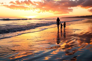 Fototapeten peaceful beach at sunset, where the mother holds her children's hands as they walk along the shoreline © Formoney