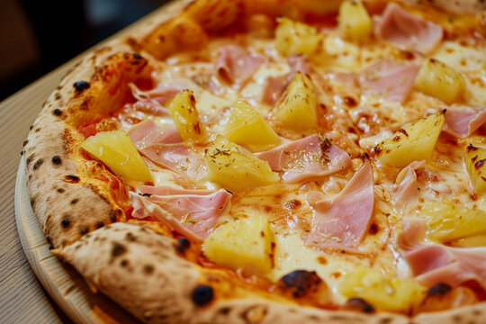 Neapolitan pizza with pineapple and ham. Hawaii neapolitan closeup 