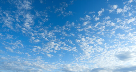 blue sky with white cumulus clouds