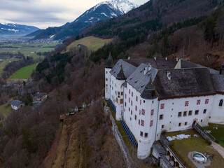 Tratzberg Castle in Tyrol, Austria. Aerial Drone View at winter twilights. White Renaissance Castle with Panorama View