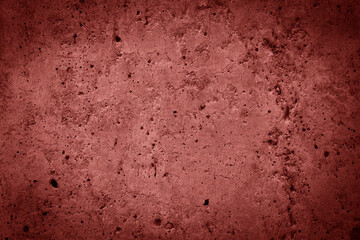 Concrete red wall background or abstract cement texture.