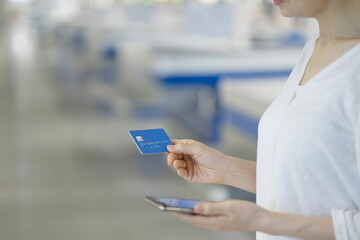 Woman shopping with credit card and smartphone 