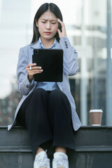 Concept of business failure and unemployment problem, unemployment stress businessman sitting on stairs.