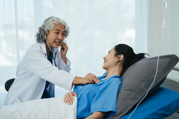 Doctor treatment patients in hospital room. Medical professionals help treat Sick people. Physical...