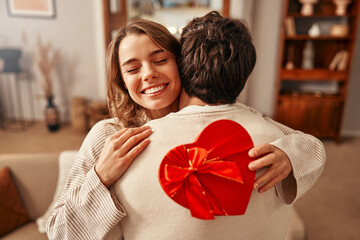 Valentine's Day. Couple in love at home. - obrazy, fototapety, plakaty