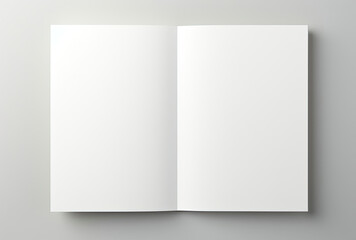 Open White Book on Gray Background