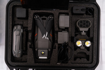 Case with drone and equipment.