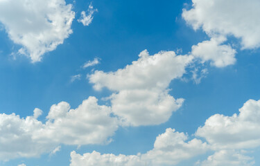 Wide sky panorama with scattered cumulus clouds. Blue sky with clouds and sun.