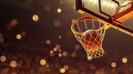 Fotobehang moment when the basketball flies through the air towards the hoop  © buraratn