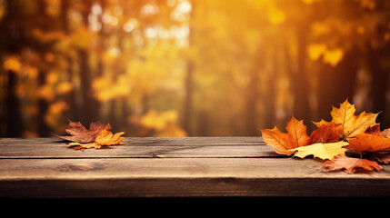 Naklejka na ściany i meble wooden table with orange fall leaves autumn natural