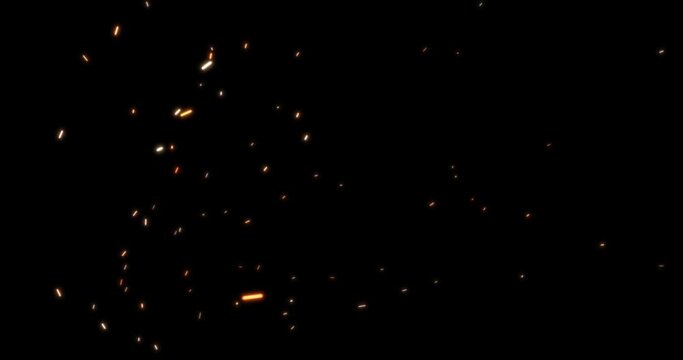 Orange sparks of an abstract campfire on a black background flying up and carried away by the wind. Seamless looping animation.