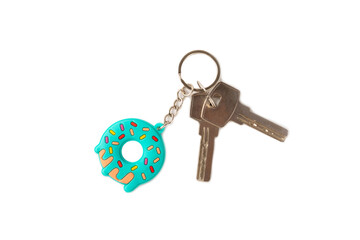 Donut shaped keychain with key ring isolated on white background. Concepts for real estate and moving home or renting property. Buying a property. Mock-up keychain.Copy space.