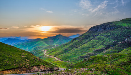 A3 highway through a gorge surrounded by mountains during sunset in the highlands of Lesotho © Arnold