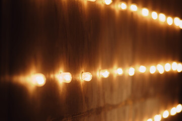 Lights on the wall. Bokeh lights background. Abstract background.
