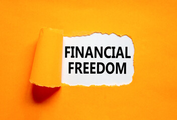 Financial freedom symbol. Concept words Financial freedom on beautiful white paper. Beautiful...