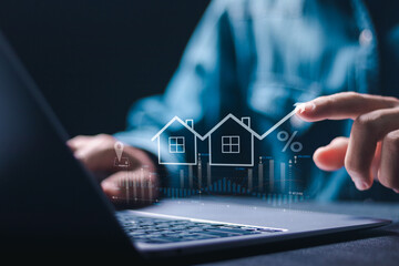 Real estate investment, Businessman use laptop with house icon for analyzing mortgage loan home and insurance real property mortgage. interest rate, Investment planning, business real estate. - obrazy, fototapety, plakaty