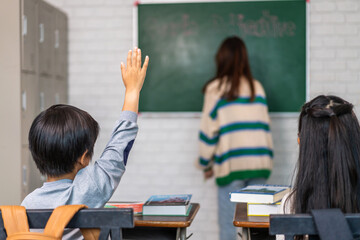 Portrait asian teacher teaching and children student raising hands for question, activity learn,...