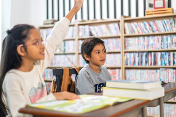 Portrait asian teacher teaching and children student raising hands for question, activity learn, study with book, student, education, knowledge, elementary, lessons, kid, child, in classroom at school