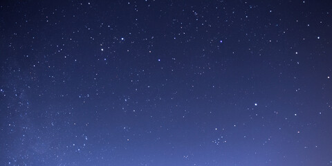 Obraz premium Starry night dark blue sky background