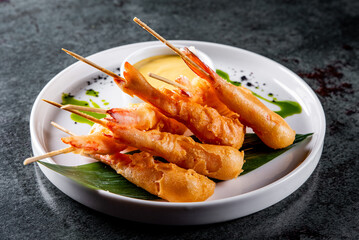 crispy Prawn tempura with garlic sauce on plate