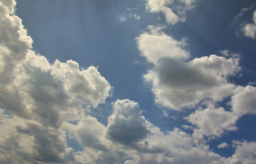 Image of clear blue sky and white clouds on day time for background usage