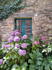 France. Brittany, old house in the garden 