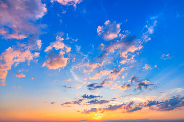 Beautiful sunset sky with fluffly clouds