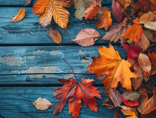 Autumn arrangement of fall leaves on a wooden table