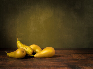 Antique-style still life with pears .