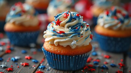 Fototapeta na wymiar Cupcakes with red white and blue decorations, july 4th celebration