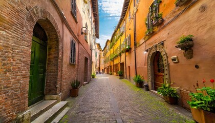 Fototapeta na wymiar cozy narrow street in ferrara emilia romagna italy