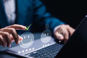 Businessman rate satisfaction by smiling face and 5-star satisfaction on online website....