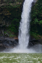 Photo Portrait Emphasizing a Dynamic Rushing Waterfall