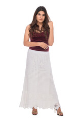 Young Indian girl wearing crochet top and jeans with elegant pose and expression