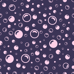 Light pink soap bubbles on a dark purple background.