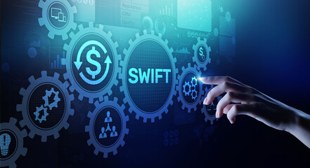 SWIFT international payment system financial technology banking and money transfer concept on virtual screen.