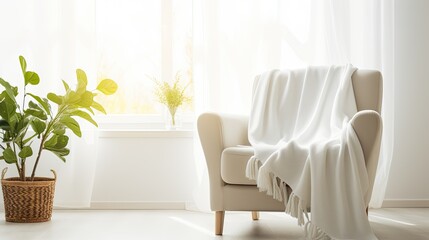 Fototapeta premium A white blanket draped over a single chair in a white living room used for mockup,