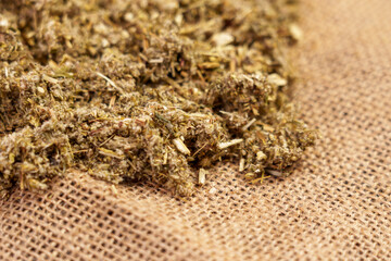 Mugwort crushed herb. Alternative herbal medicine