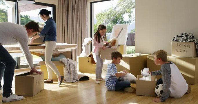 Family, moving and new home with boxes, real estate and property owners with kids, mother and father. House, relocation and investment in living room, unpacking or renovation for parents, son or girl