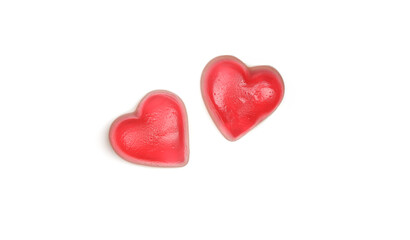 Two heart shaped jelly gummy treats isolated on white background