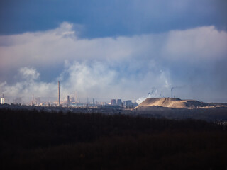 The city is smoky with factories.