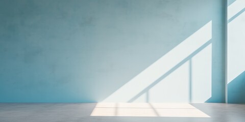 Fototapeta premium Minimal abstract light blue background for product presentation. Shadow and light from windows on plaster wall