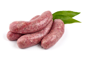 German Oktoberfest Sausages with basil leaf, close-up, isolated on white background.