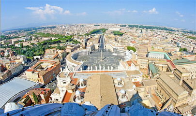 view from above of Rome and the Vatican city and square from above the dome of St. Peter s Basilica