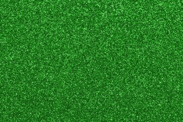 background of glitterd material of color GREEN ideal as backdrop